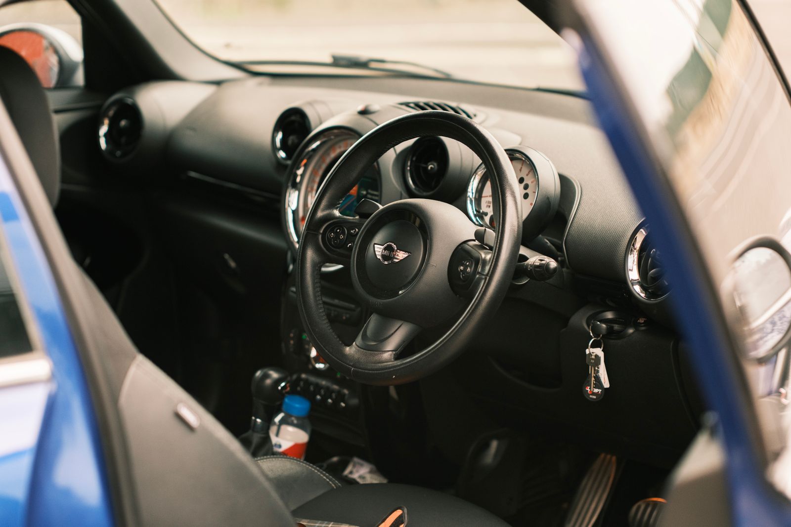 Steering wheel and dashboard inside a compact car